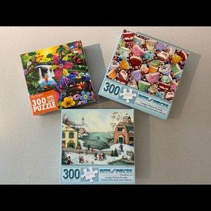 Three 300 piece jigsaw puzzles